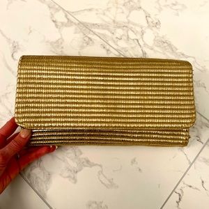 HM GOLD woven clutch.